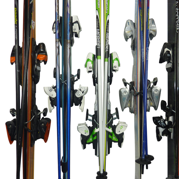 Ski wall mount. Wall Ski Rack and Ski Hanger for up to 6 pairs of skis. GearHooks ski rack with 6 pairs of skis and poles. Staggered bindings closeup
