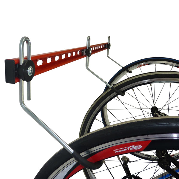 Wall  bike rack for 3 bikes close up of road bike wheels