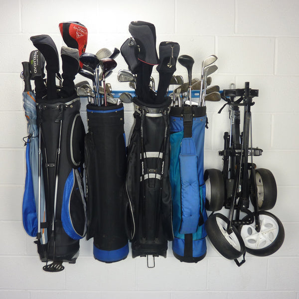 Golf bag storage rack with 4 full golf bags and 2 trolleys