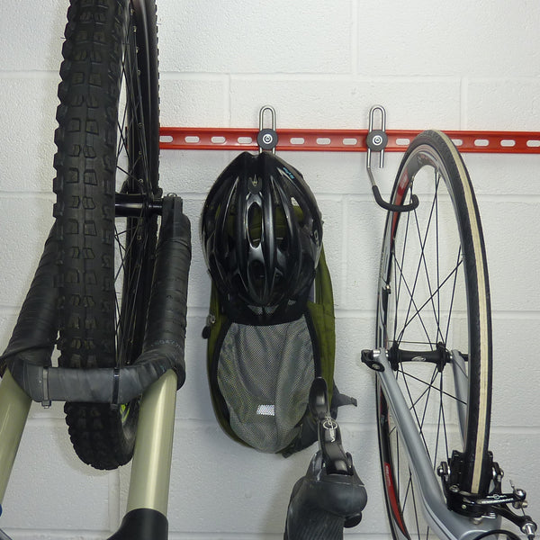 Bike Wall Hooks. GearHooks bike accessory storage hook showing rucksack and helmet storage hook