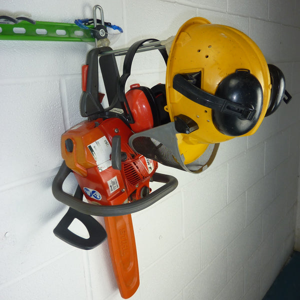 Heavy duty garden tool rack hook with petrol chainsaw, ear defenders and helmet